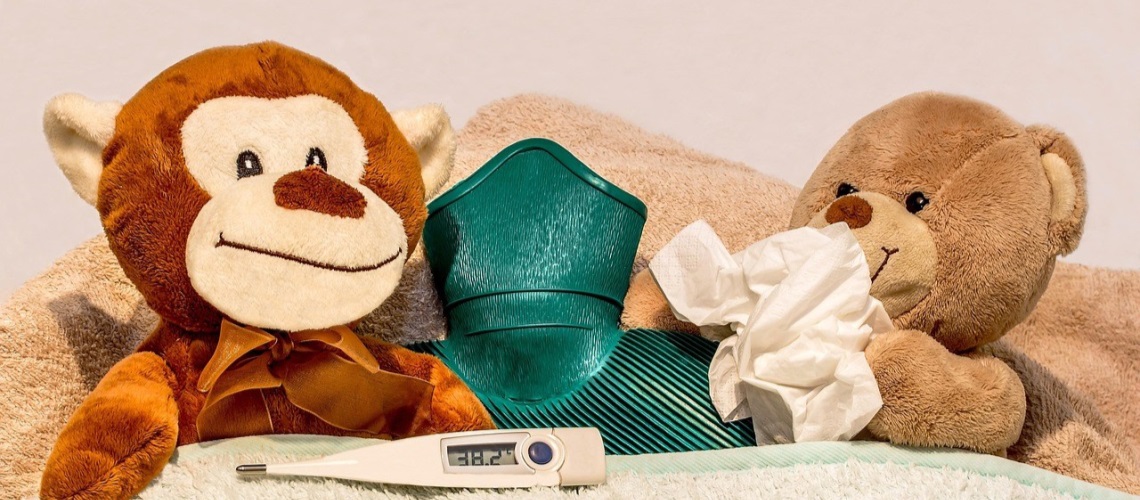 Bamser i seng som er forkjølet